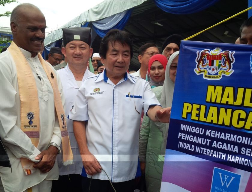 Joseph Kurup (centre) is pictured at the launch of the World Interfaith Harmony Week 2015 in Klang, February 5, 2015. u00e2u20acu201d Picture by Yiswaree Palansamy 