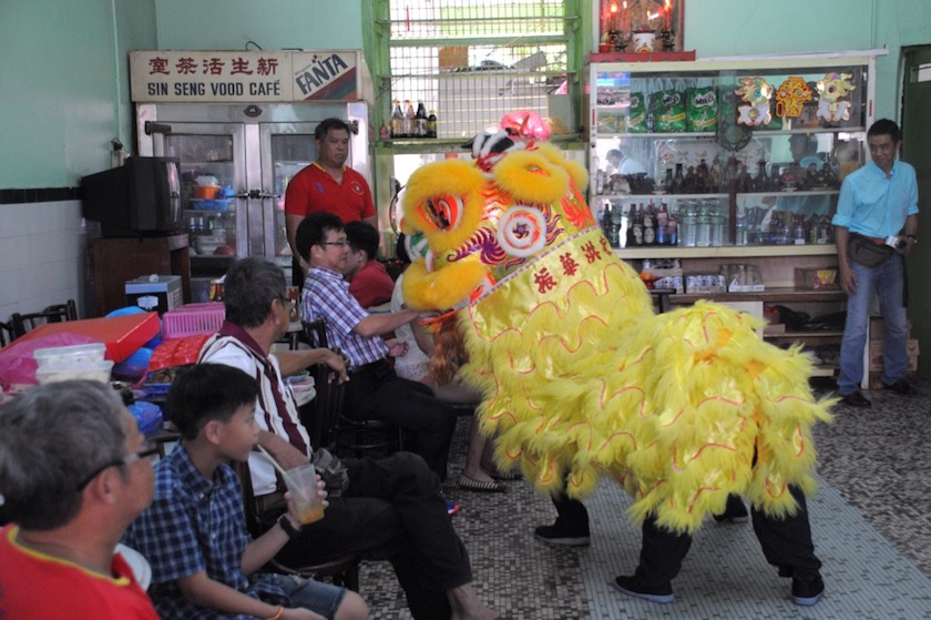 A lion dance performance to usher in the Chinese New Year is believed to bring good luck and prosperity to the shop owners. u00e2u20acu201du00c2u00a0Picture by K.E.Ooi.