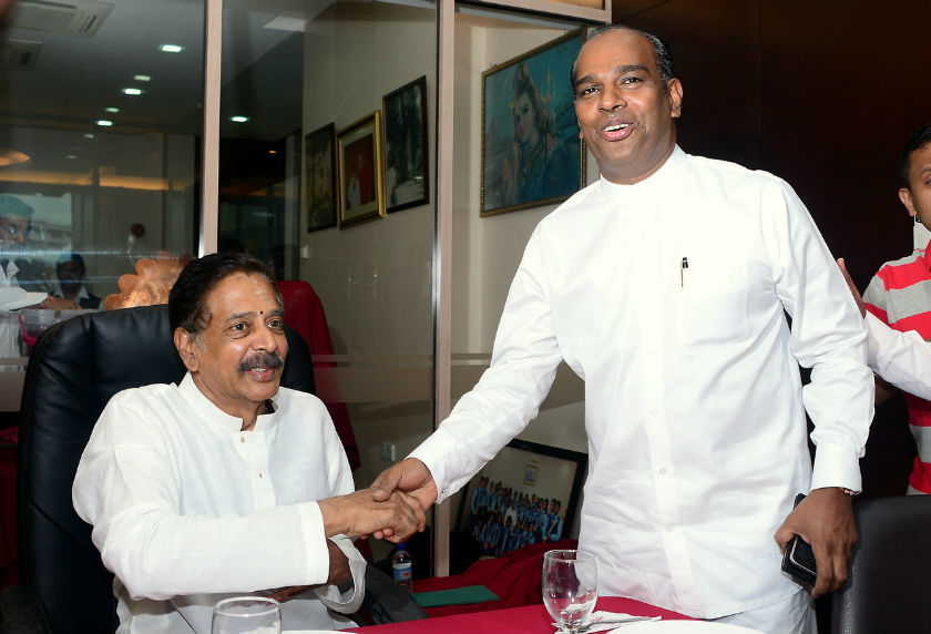 Datuk Seri G. Palanivel (left) shaking hands with Datuk M. Saravanan after launching the exhibition u00e2u20acu02dcThe History of Batu Cavesu00e2u20acu2122 to commemorate the 125th anniversary celebration of Thaipusam, February 3, 2015. u00e2u20acu201d Bernama pic