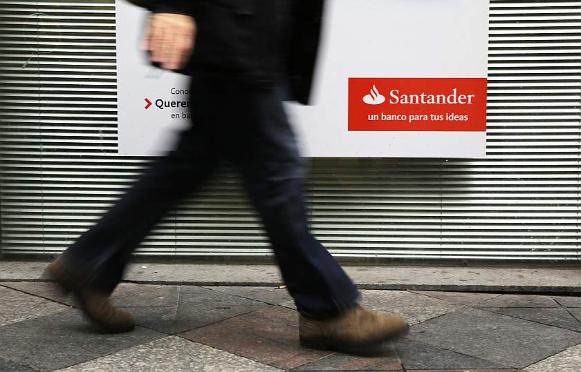 A man walks past a Santander bank branch in central Madrid February 3, 2015. u00e2u20acu201d Reuters pic