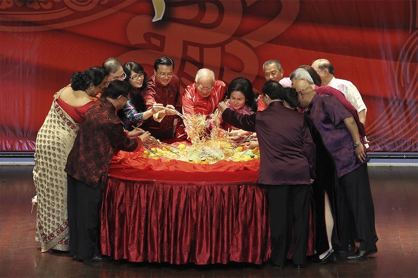 Datuk Seri Najib Razak, Tan Sri Muhyiddin Yassin, Datuk Seri Dr Liow Tiong Lai and their wives enjoying the yee sang at MCA's Chinese New Year Open House in Kuala Lumpur, Feb 19, 2015. u00e2u20acu201d Picture by Yusof Mat Isa 