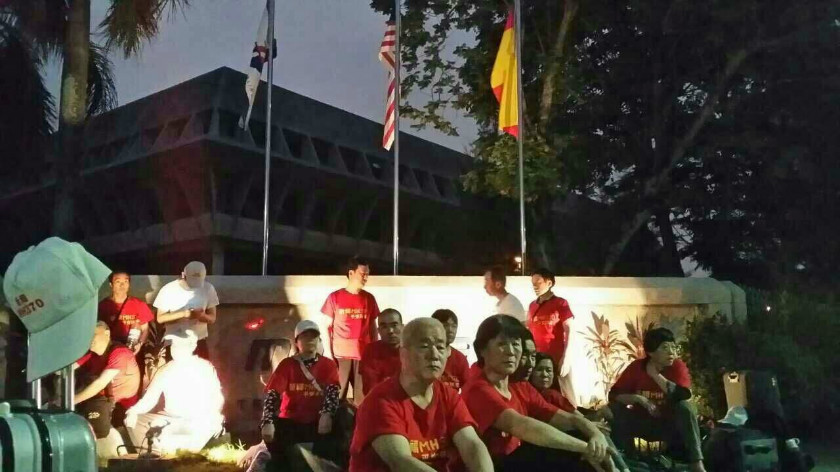 Relatives of missing flight MH370 Chinese passengers gather outside MAS Subang office since the afternoon under hot sun and without shelter, February 13, 2015. u00e2u20acu201d Picture courtesy of Voice370