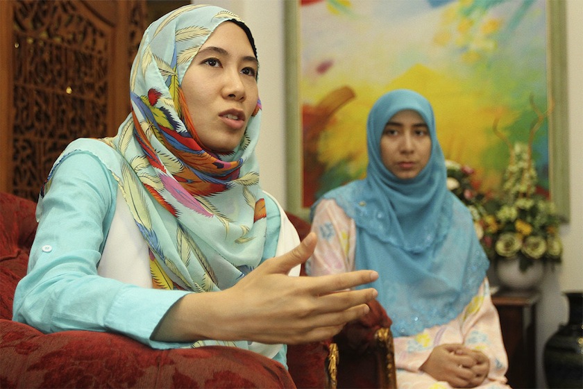 Nurul Nuha Anwar (left) is joined by Nurul Ilham Anwar during an interview at her house in Segambut, Kuala Lumpur, February 23, 2015.u00c2u00a0u00e2u20acu201du00c2u00a0Picture by Yusof Mat Isa