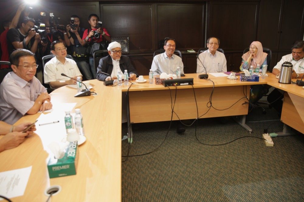 PKR leaders led by Datuk Sri Anwar Ibrahim (centre) talk to the press at the Pakatan Rakyat Council meeting at the PAS headquarters in Kuala Lumpur, February 8, 2015. u00e2u20acu201d Picture by Choo Choy May