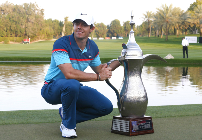 Rory McIlroy of Northern Ireland poses with the winner's trophy of the Dubai Desert Classic golf tournament in Dubai February 1, 2015. u00e2u20acu201d Reuters pic