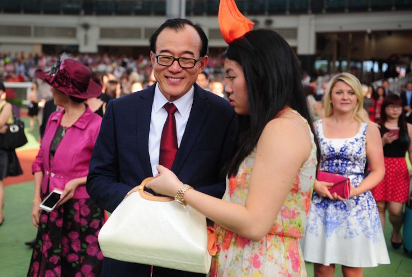 Chairman of China Horse Club (CHC) Malaysian tycoon Teo Ah Khing attends the China Equine Cultural Festival Singapore Cup horse race in Singapore February 22, 2015. — AFP pic