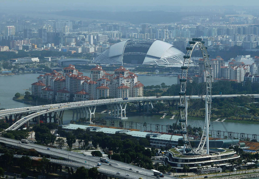 A general view of the National Stadium (top centre) in the skyline of Singapore February 10, 2015. The 55,000-capacity National Stadium with retractable roof will host the 28th South East Asian (SEA) games from June 5 to 16. u00e2u20acu201d Reuters pic