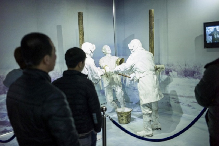 Visitors look at a scene of human experiments at the Unit 731 museum in Harbin, northeast Chinau00e2u20acu2122s Heilongjiang province, in this picture taken on January 7, 2015. u00e2u20acu201d AFP pic