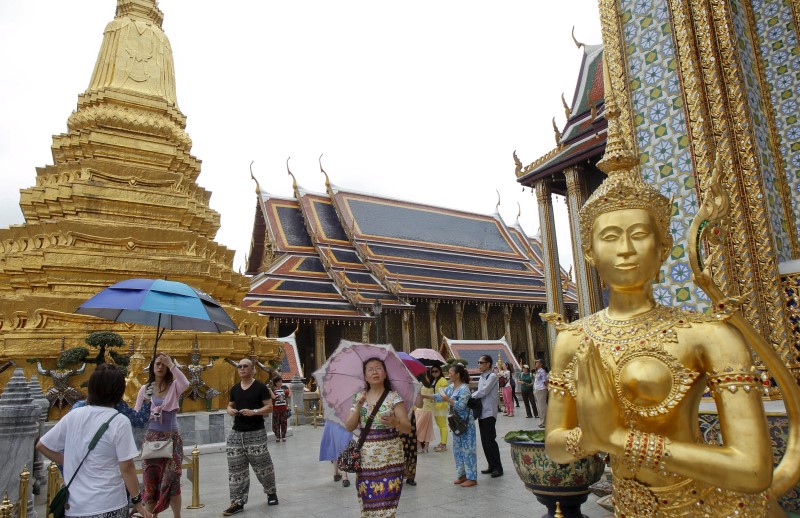 Chinese tourists visit Wat Phra Kaeo (Emerald Buddha Temple) in Bangkok March 27, 2015. u00e2u20acu201d Reuters pic