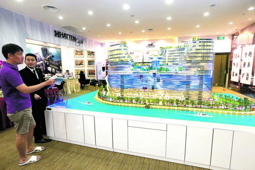 A model of Harbour City@Pulau Melaka at a roadshow in Singapore yesterday. u00e2u20acu201d Today pic 