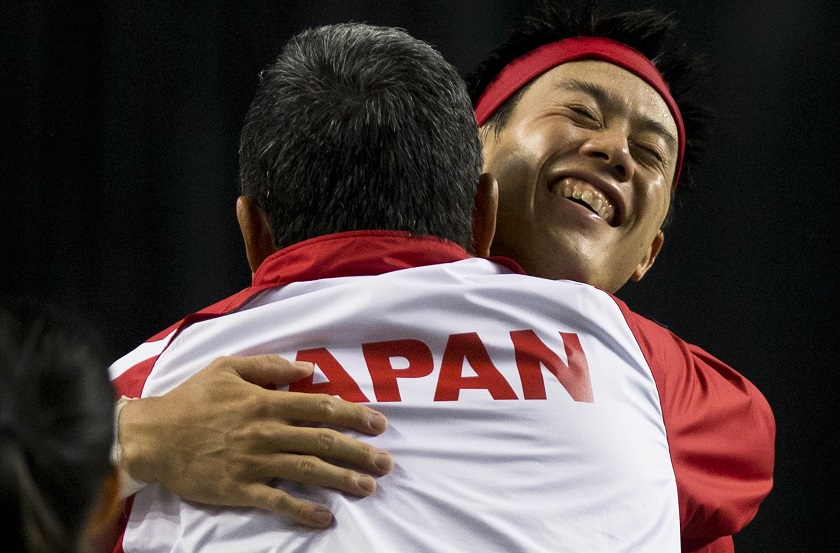 Japanu00e2u20acu02dcs Kei Nishikori celebrates his victory over Canadau00e2u20acu02dcs Milos Raonic with team captain Minoru Ueda following his Davis Cup tennis match at the Doug Mitchell Thunderbird Sports Centre in Vancouver, British Columbia, March 8, 2015. u00e2u20acu201d Reuters pic