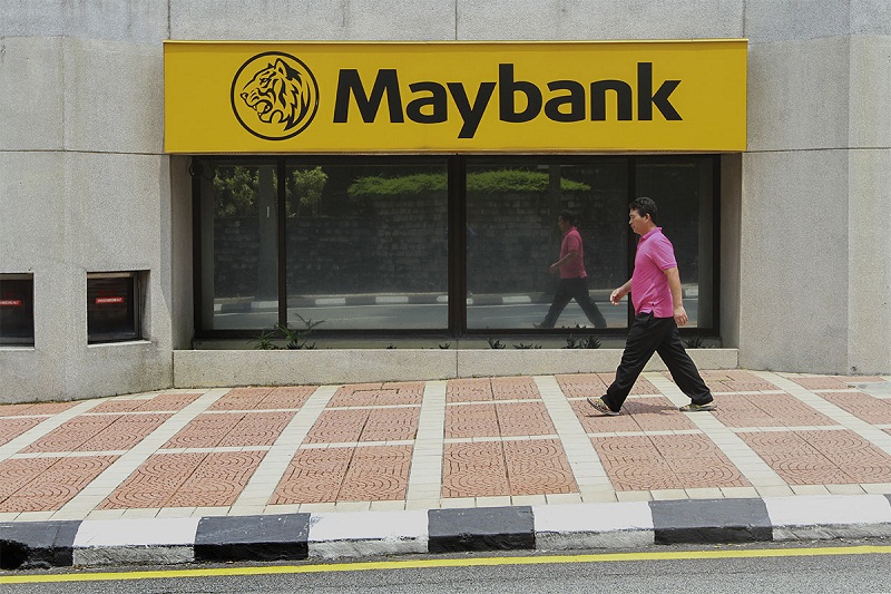 A man walks past a Maybank branch at the Dayabumi Complex in Kuala Lumpur, March 30, 2015. u00e2u20acu201d Picture by Yusof Mat Isa 
