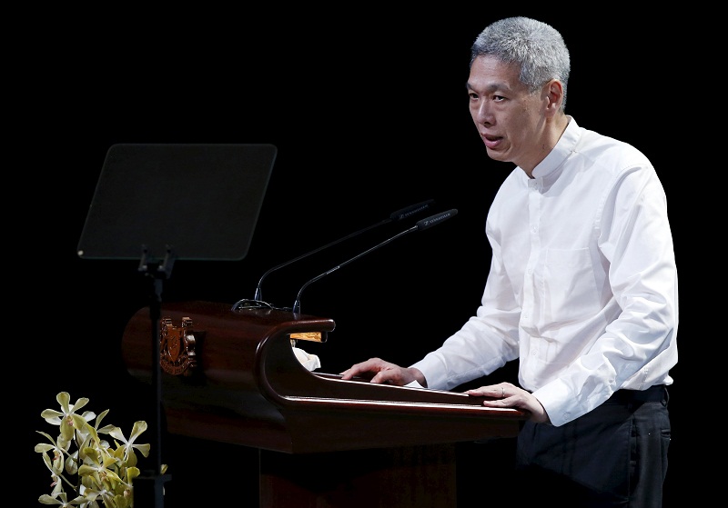 Lee Hsien Yang, son of former leader Lee Kuan Yew, delivers his eulogy during the funeral service at the University Cultural Centre at the National University of Singapore March 29, 2015. — Reuters pic