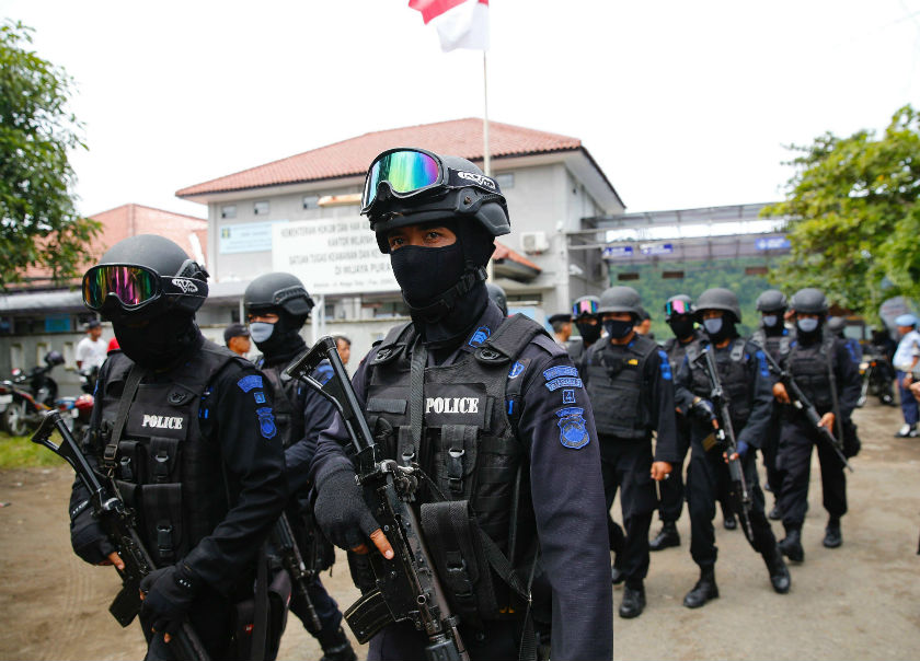 Members of the Indonesian special police leave the ferry port after returning from the prison island of Nusa Kambangan following the transfer of two convicted u00e2u20acu02dcBali Nineu00e2u20acu2122 Australian drug smugglers, in Cilacap, Central Java March 4, 2015. u00e2u20acu201d Reuters p