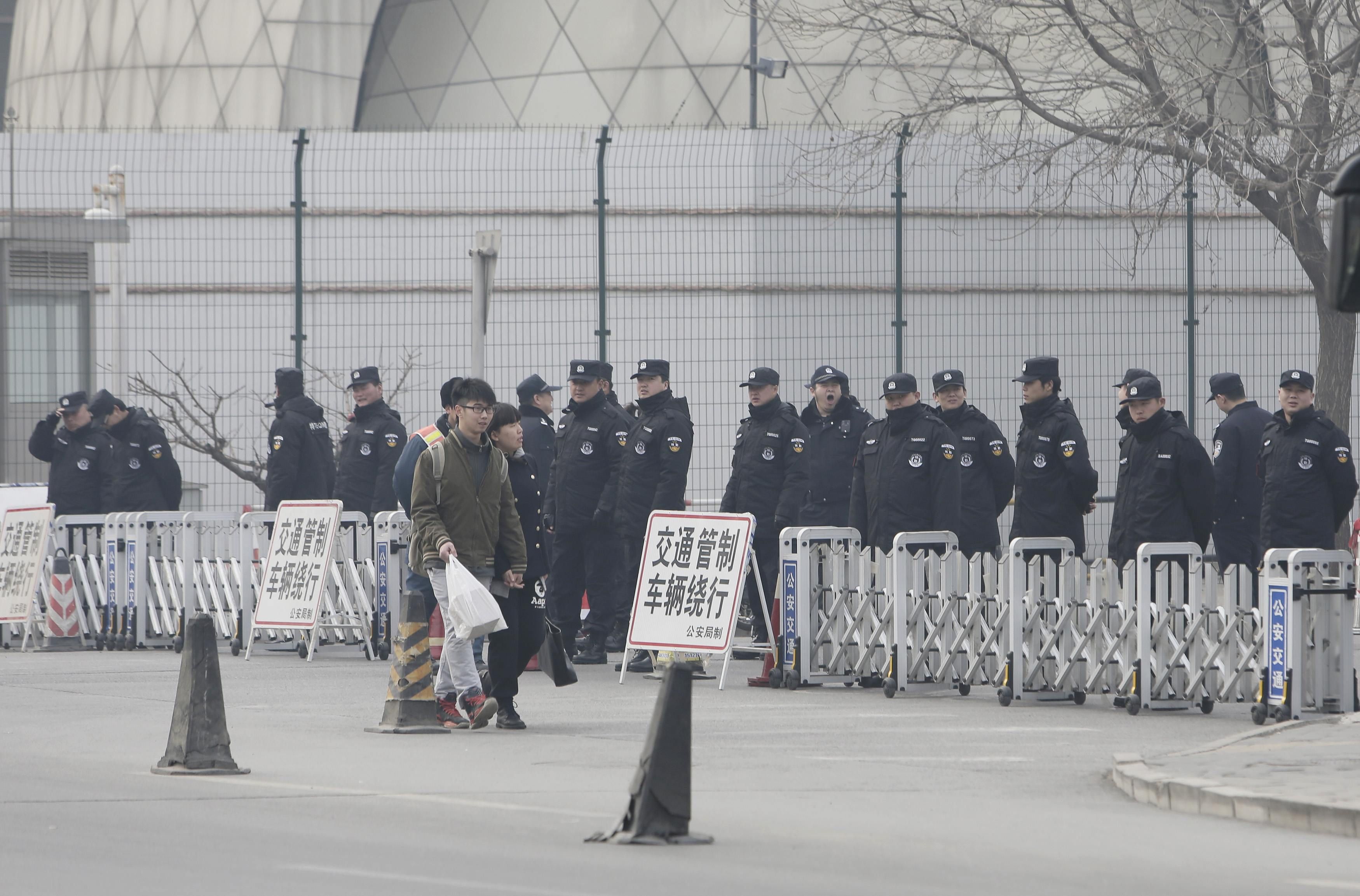 Police guard outside the Malaysian embassy on the one-year anniversary of the disappearance of Malaysia Airlines Flight MH370, in Beijing March 8, 2015. u00e2u20acu201d Reuters pic