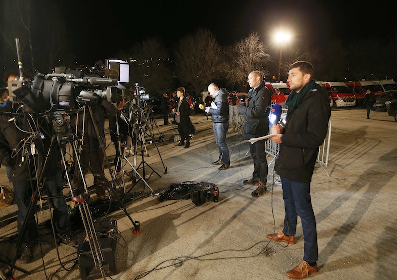 Members of the media present live coverage at night in a field several kilometers from the crash site of an Airbus A320, near Seyne-les-Alpes, in the French Alps, March 24, 2015. u00e2u20acu201d Reuters pic