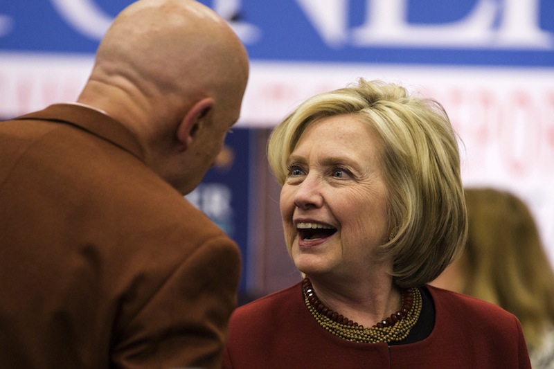 Former US Secretary of State Hillary Clinton speaks with a guest before delivering remarks at the 2015 Toner Prize for Excellence in Political Reporting award in Washington March 23, 2015.u00c2u00a0u00e2u20acu201d Reuters pic