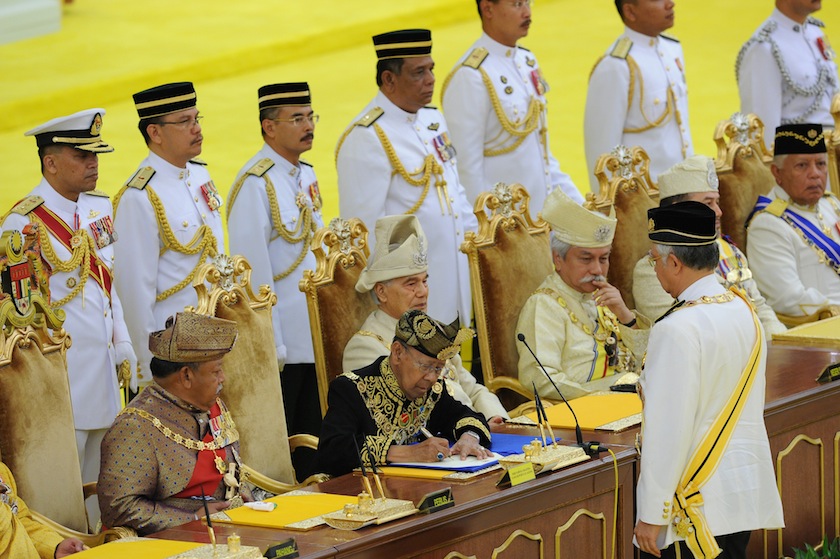 Yang di-Pertuan Agong Tuanku Abdul Halim Muu00e2u20acu2122adzam Shah signs a proclamation declaring him the 14th king of Malaysia at the new National Palace in Jalan Duta, Kuala Lumpur on December 13, 2011.u00c2u00a0u00e2u20acu201d AFP picn