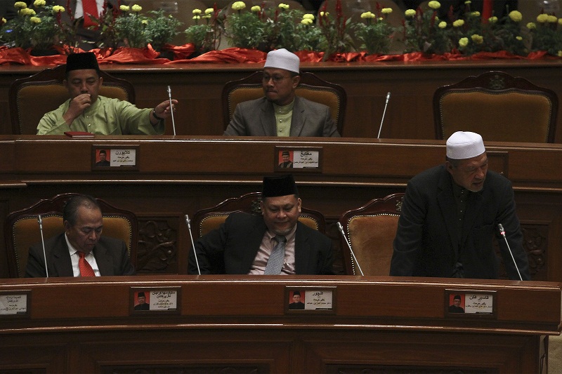 Kelantan Mentri Besar Datuk Ahmad Yakob (right) speaks during the Kelantan State Assembly at Kompleks Darul Naim in Kota Baru March 18, 2015. u00e2u20acu201d Picture by Yusof Mat Isa