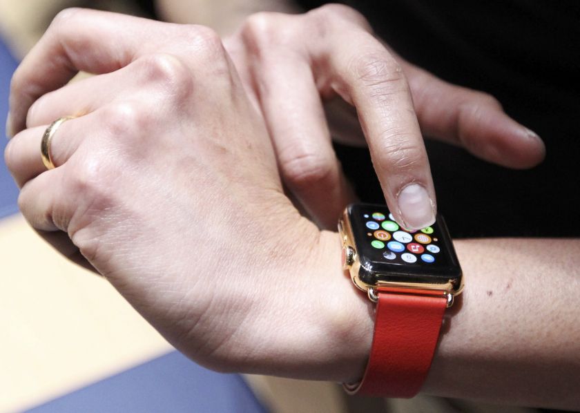 An attendee tries out an Apple Watch folowing an Apple event in San Francisco, California March 9, 2015. u00e2u20acu201d Reuters pic
