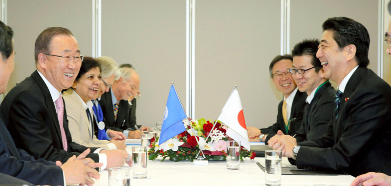 UN Secretary-General Ban Ki-Moon (left) speaks with Japan's Prime Minister Shinzo Abe (right) during the third UN World Conference on Disaster Risk Reduction (WCDRR) in Sendai, March 14, 2015, in this photo taken by Kyodo. u00e2u20acu201d Reuters pic