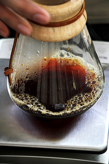 Some baristas mix it up by adding filter-brewed coffee to their espresso blend to create their signature drink