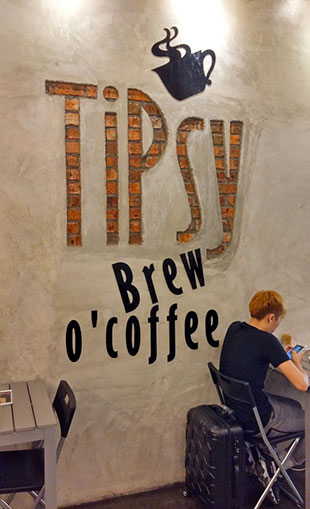 TiPsy Brew O' Coffee has an industrial look with exposed brick walls and wooden elements.
