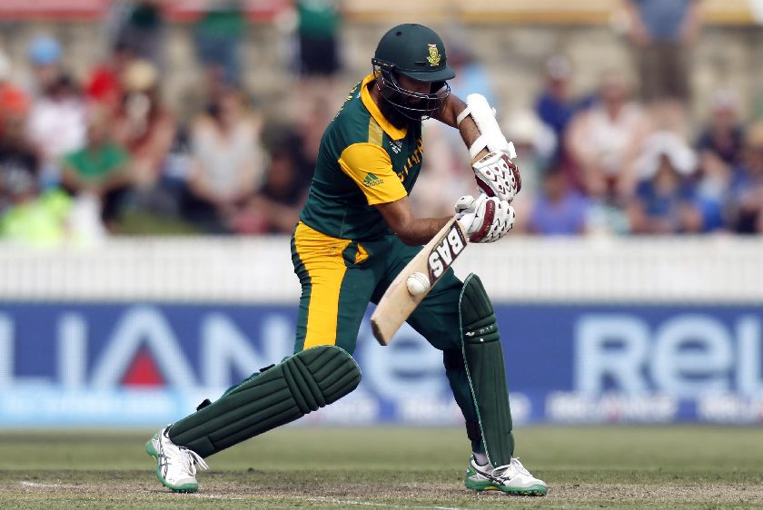 South Africau00e2u20acu2122s Hashim Amla hits a boundary during their Cricket World Cup match against Ireland at Manuka Oval in Canberra March 3, 2015. REUTERS/Jason Reed