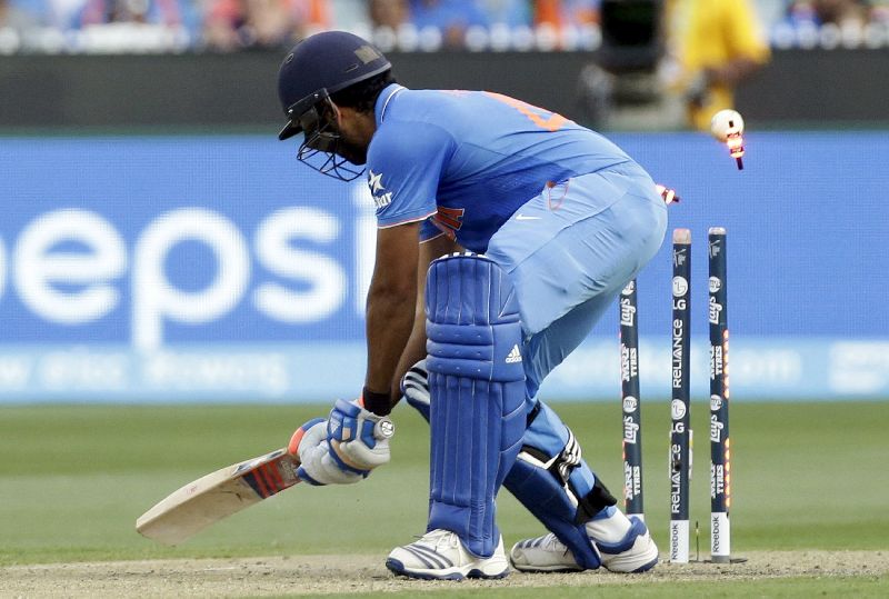 Indiau00e2u20acu2122s batsman Rohit Sharma is bowled by Bangladeshu00e2u20acu2122s Taskin Ahmed in their Cricket World Cup quarter-final match in Melbourne, March 19, 2015. REUTERS/Hamish Blair