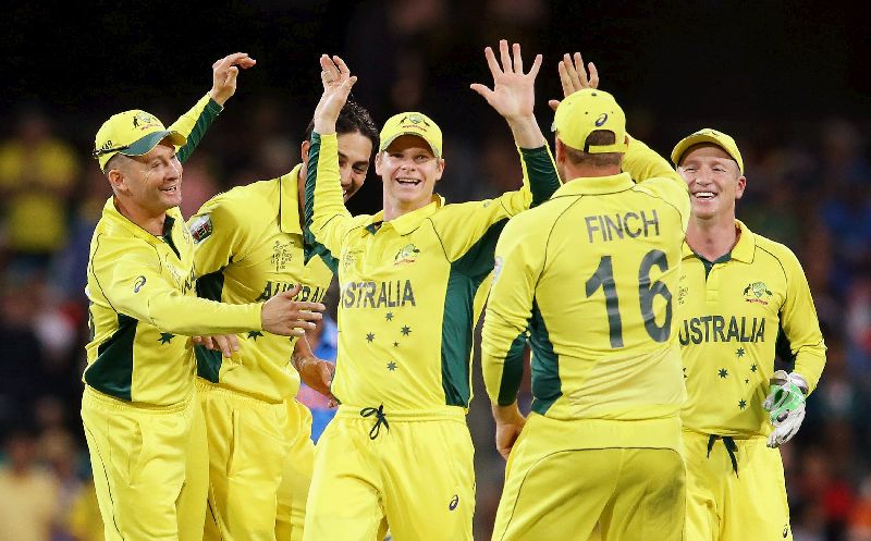 Australiau00e2u20acu2122s Steve Smith (C) high-fives with Aaron Finch and other teammates (L-R) captain Michael Clarke, Mitchell Johnson and Brad Haddin after running out Indiau00e2u20acu2122s Ravindra Jadeja Cricket World Cup semi-final in Sydney, March 26, 2015. REUTERS