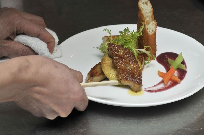 A chef serves up a dish using duck and goose foie gras to give a French flair to traditional Chinese dumplings at a restaurant in Beijing. AFP-Relaxnews supplied