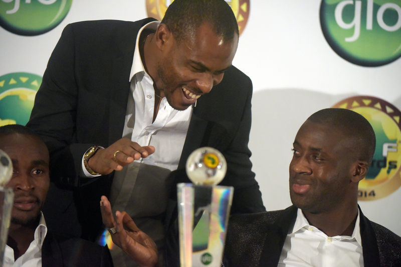 Nigerian goalkeeper Vincent Enyeama (centre) congratulates Ivorian skipper Yaya Toure after winning the CAF African Footballer of the Year Award in Lagos on January 8, 2015. u00e2u20acu201d AFP pic