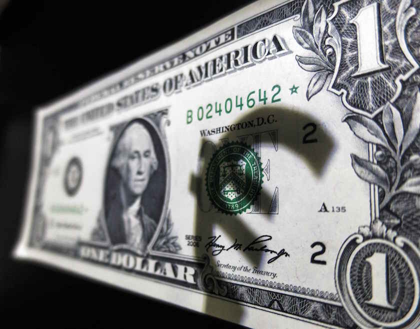 The shadow of the logo of Euro is seen on a US one dollar note in this picture illustration taken in Madrid March 10, 2015. u00e2u20acu201d Reuters pic