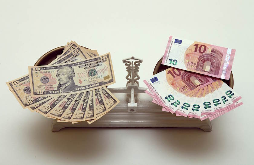A picture illustration shows US Dollar and Euro banknotes on a pair of scales in Vienna March 11, 2015. u00e2u20acu201d Reuters pic