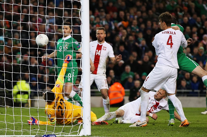 Irelandu00e2u20acu2122s Shane Long (left) scores a goal against Poland during the Euro 2016 Qualifying Group D match at the Aviva Stadium in Dublin, March 30, 2015. u00e2u20acu201d Reuters pic