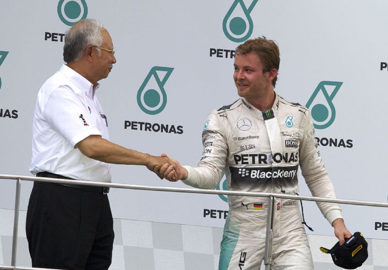 Prime Minister Datuk Seri Najib Tun Razak at the Formula 1 Petronas Malaysia Grand Prix 2015 at Sepang International Circuit outside Kuala Lumpur March 29, 2015, congratulating Mercedes AMG Petronas team driver Nico Rosberg fotoBernama