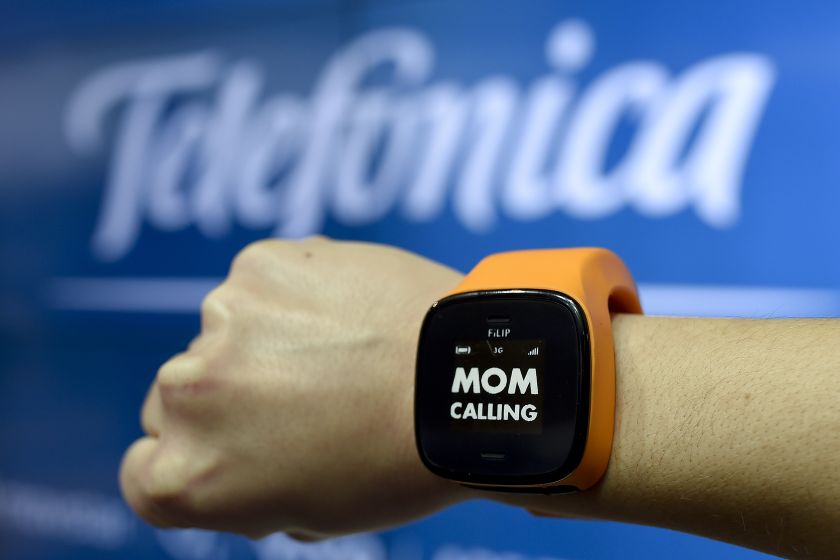 A hostess presents a watch u00e2u20acu02dcFiLIPu00e2u20acu2122 by Telefonica during the 2015 Mobile World Congress (MWC) in Barcelona on March 3, 2015. u00e2u20acu201d AFP pic