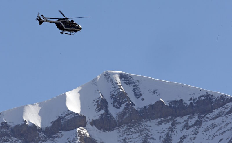 A rescue helicopter from the French Gendarmerie flies over the snow covered French Alps during operations near the crash site of the Germanwings Airbus A320, near Seyne-les-Alpes, March 28, 2015. u00e2u20acu201d Reuters pic