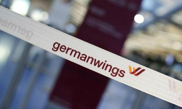 A barrier tape of Lufthansa's German low-cost carrier Germanwings is pictured at a closed gate at Berlin Tegel airport February 12, 2015. u00e2u20acu201d Reuters pic