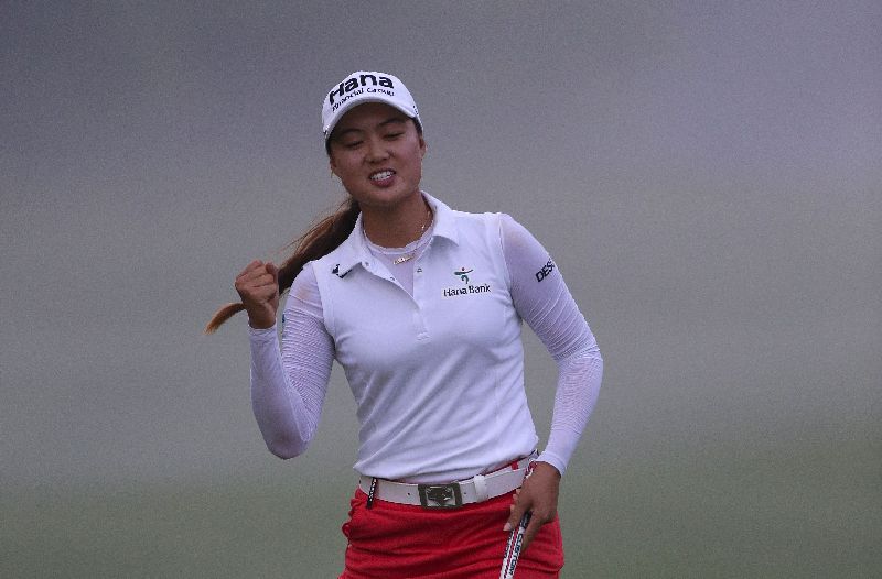 Clutch putt for Minjee Lee of Australia making her eagle on the 15th hole, final round, Kingsmill Championship, River Course, Kingsmill Resort, May 17, 2015 in Williamsburg, Virginia. Hunter Martin/Getty Images/AFP