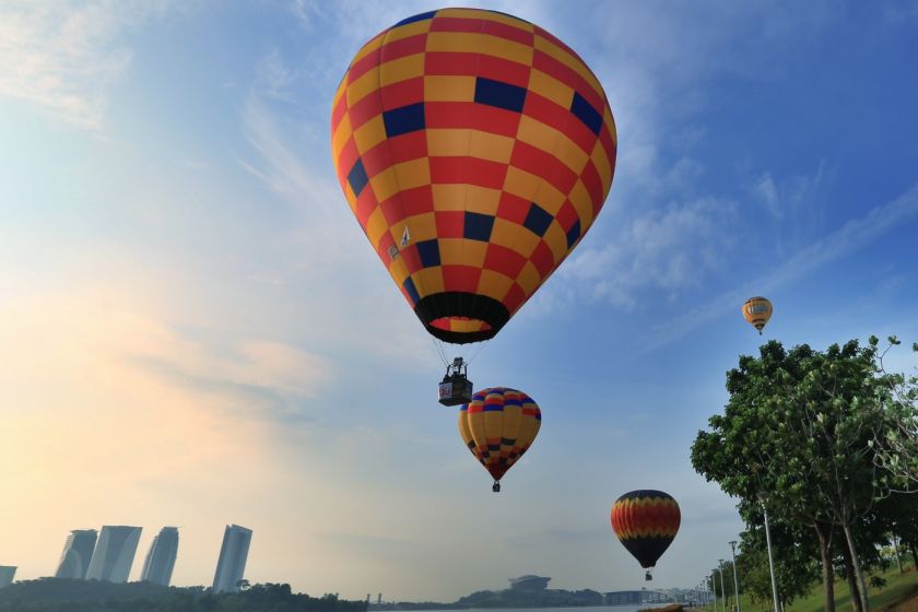 Hot air balloons fly over the Putrajaya Lake and Cyberjaya, March 12, 2015. u00e2u20acu201d Picture by Saw Siow Fengnn