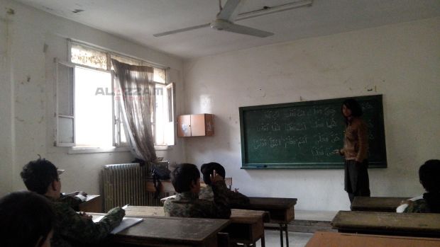 Islamic State child recruits are seen attending school in this picture released by the Abdullah Azzam academy. u00e2u20acu2022 Picture taken from azzammedia.com