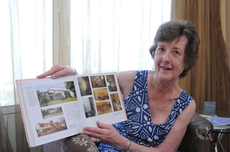 Ruth Iversen Rollitt showing her book on her father, BM Iversen the architect. — Picture by K. E Ooi