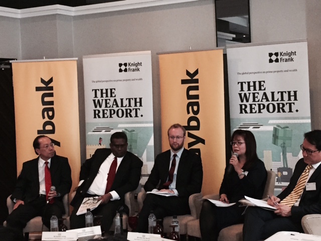 Knight Frank’s Holt (centre) attributed the drop in the wealth of Malaysians as largely due to the weakened value of the ringgit and the falling prices of oil worldwide. — Picture by Shaun Tan