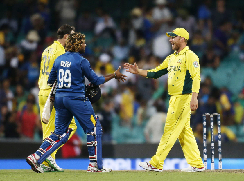 Sri Lanka's Lasith Malinga (left) shakes hands with Australia's Aaron Finch after their Cricket World Cup match in Sydney, March 8, 2015. u00e2u20acu201d Reuters pic