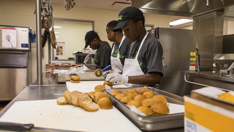 Students prepare food in a kitchen in this July 18, 2013 handout photo provided by Liberty's Kitchen in New Orleans, Louisiana, March 3, 2015. u00e2u20acu201d Reuters pic