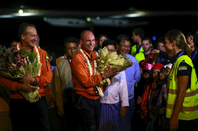 Swiss pilots Bertrand Piccard (right) and Andre Boschberg are greeted after Piccard landed the Solar Impulse 2, the first round-the-world solar-powered plane, at Mandalay International Airport March 19, 2015. u00e2u20acu201du00c2u00a0Reuters pic