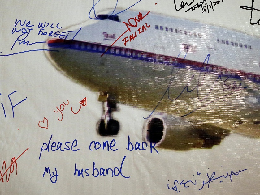 A message left on a board of remembrance by Kelly (last name not given), 29, the wife of a passenger aboard missing Malaysia Airlines Flight MH370, at a vigil ahead of the one-year anniversary of its disappearance in Kuala Lumpur, March 7, 2015. u00e2u20acu201d Reute