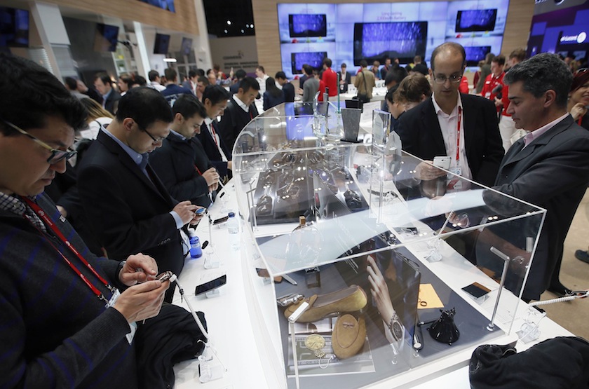 People look devices at the LG stand during the Mobile World Congress in Barcelona March 5, 2015. u00e2u20acu201du00c2u00a0Reuters pic