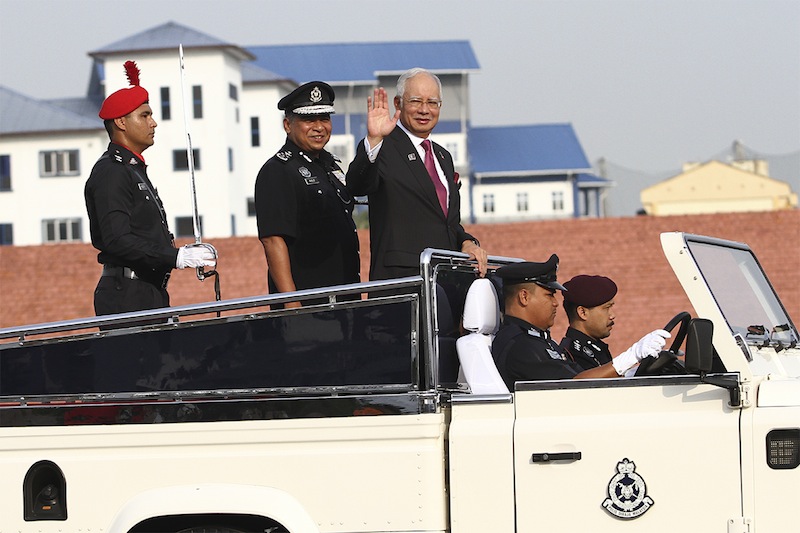 Prime Minister, Datuk Seri Najib Razak and Inspector-General of Police Tan Sri Khalid Abu Bakaru00c2u00a0inspecting the guards-of-honor during the 208th Police Day at the Police Training Centre in Kuala Lumpur, March 25, 2015. u00e2u20acu201d Picture by Yusof Mat Isa 